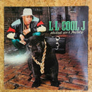 LL COOL J WALKING WITH A PANTHER